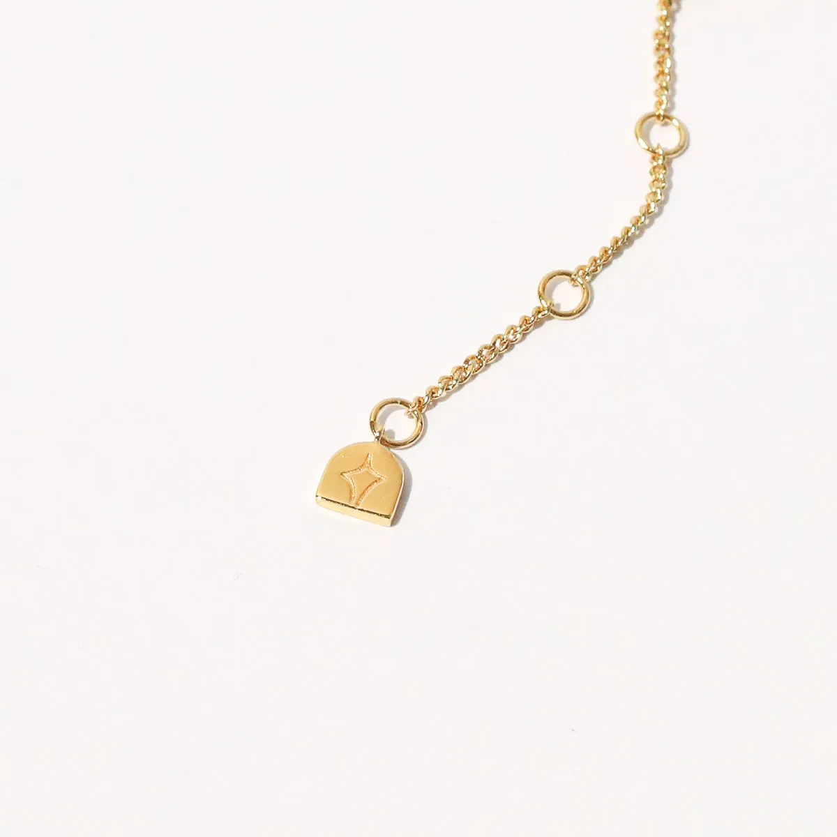 Cosmic Star Bar Necklace in Gold